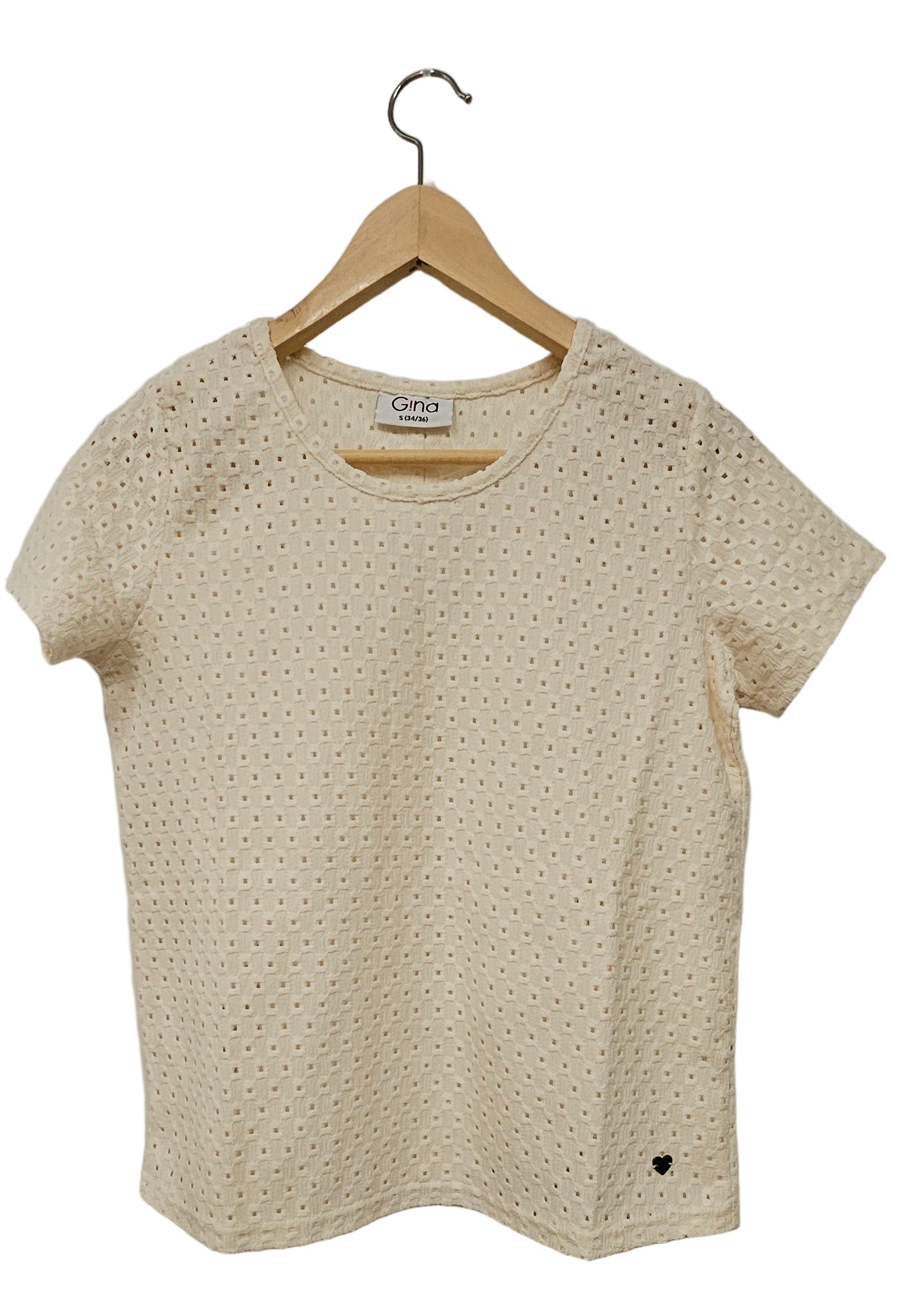 Blus med knappar bak