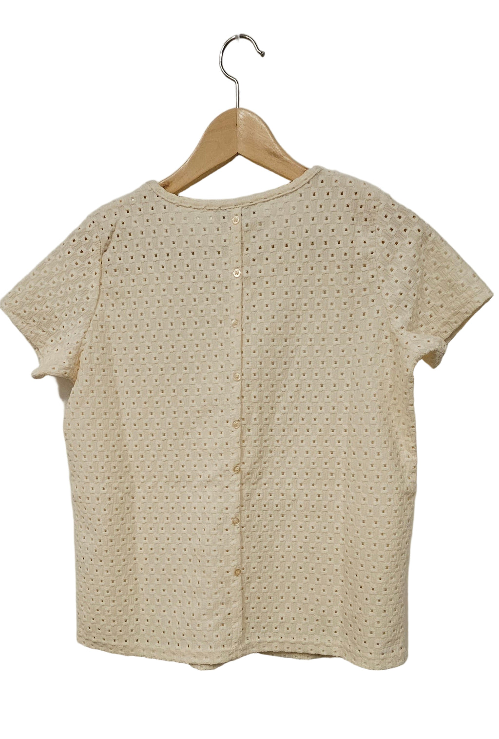 Blus med knappar bak